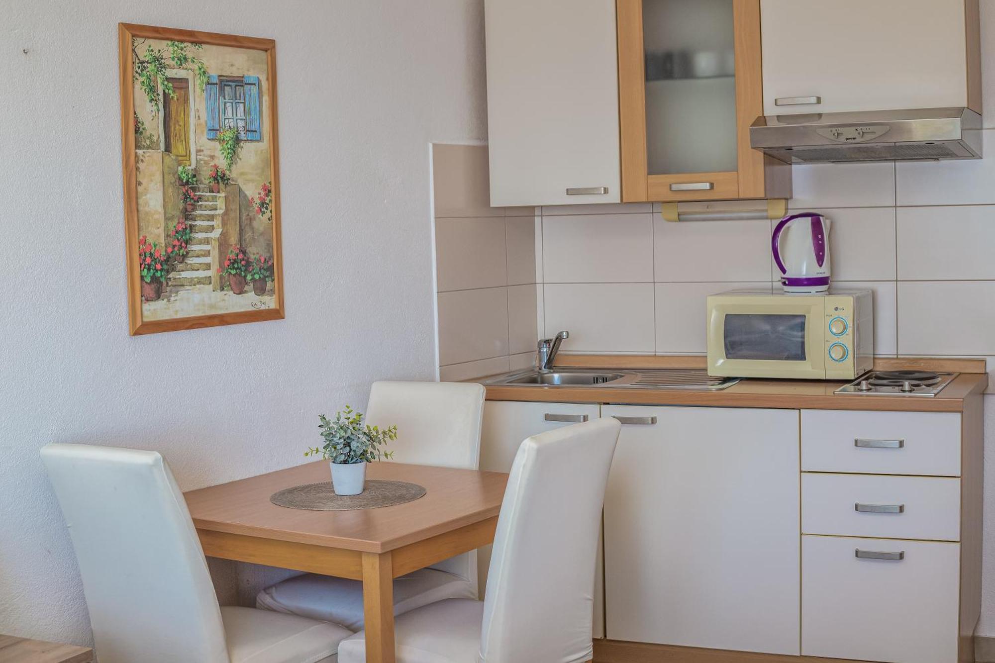 Apartments Gudelj พอดโกรา ภายนอก รูปภาพ